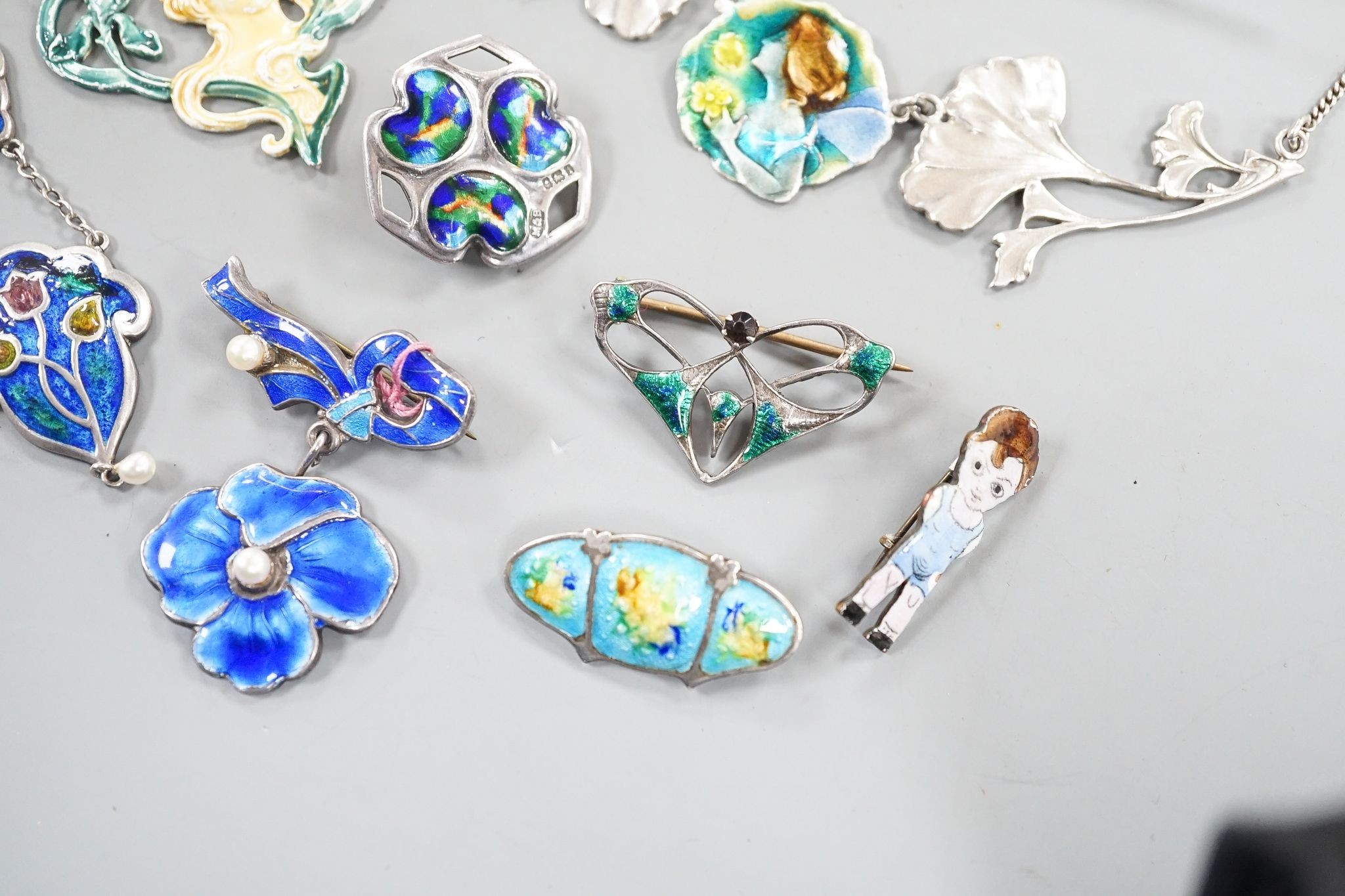 A small collection of early to mid 20th century silver or white metal and enamel jewellery, including brooch by Charles Horner and brooch by Marples & Beasley.